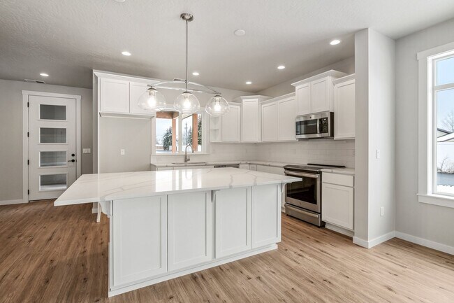 Building Photo - Luxury living in Coeur d'Alene's newest ga...