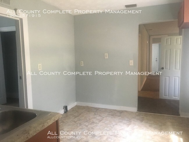 Building Photo - Price Improvement! Four-Bedroom Home