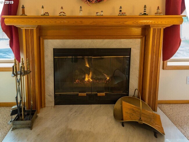 Building Photo - Charming 4-Bed, 2-Bath Home with Vaulted Ceilings, Dual Fireplaces & Serene Outdoor Spaces