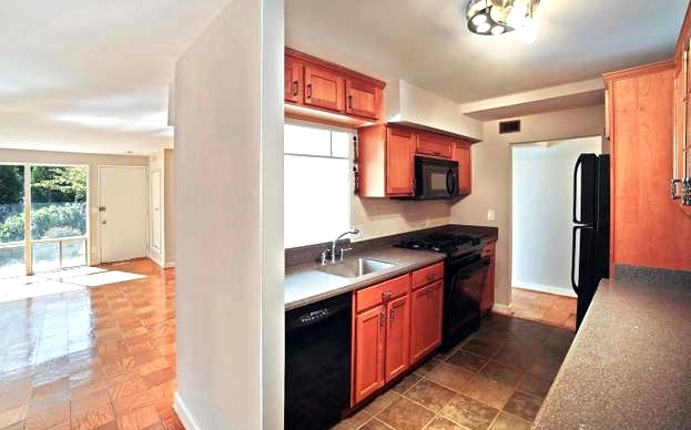 KITCHEN WITH MANY CABINETS - 7504 Spring Lake Dr