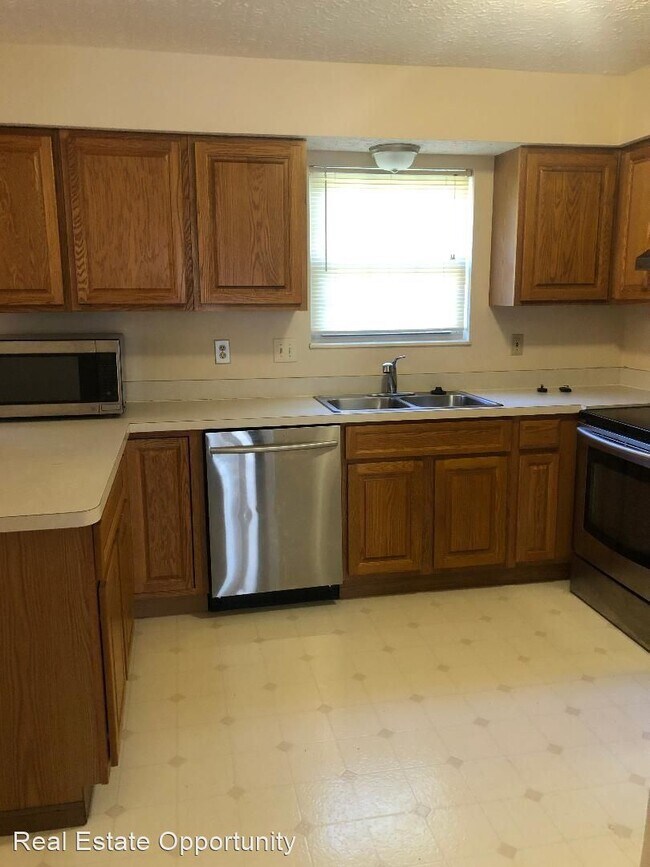 Foto del edificio - 4 br, 2.5 bath House - 7602 RIPPINGALE ST