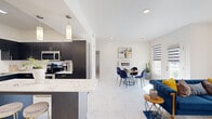 Located in the Chenal Valley area of Little Rock, AR, this well-appointed one-bedroom, one-bathroom residence offers a thoughtfully designed single-level layout that balances modern aesthetics with everyday functionality. Striking marble-look tile flooring flows seamlessly throughout the entire unit, creating a cohesive and polished atmosphere from room to room.

The open-concept kitchen, dining, and living area serves as the heart of the home. The kitchen is outfitted with dark espresso cabinetry, quartz countertops with dramatic veining, and a full suite of stainless steel appliances, including a French door refrigerator, range, and microwave. A peninsula with bar seating provides additional prep space and casual dining options. The living area offers generous natural light through large bay windows dressed with layered roller shades, contributing to an airy, welcoming feel.

The spacious bedroom features a ceiling fan, a wide window for natural light, and direct access to both a walk-in closet with wire shelving and the full bathroom. The bathroom continues the marble-look tile aesthetic and includes a dark-toned vanity with sleek hardware. A connecting hallway ties each space together efficiently, and a dedicated closet provides ample storage for the unit's single-floor footprint.