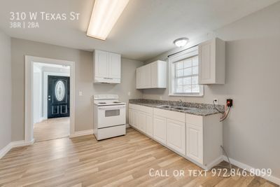 Foto del edificio - 310 W Texas St