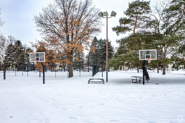 Shoot some hoops at the basketball courts in Matthews Park.