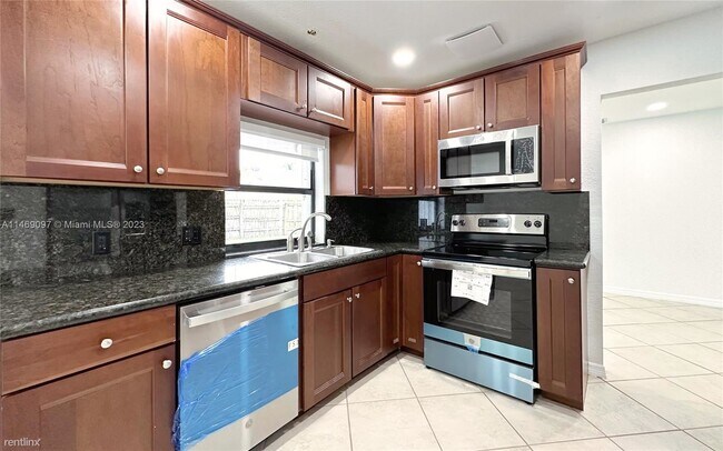 Building Photo - 3 br, 2 bath House - 8440 NW 4th St