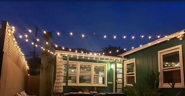 Front patio at night (exterior outlet provided but bring your own string lights) - 5536 W 134th Pl
