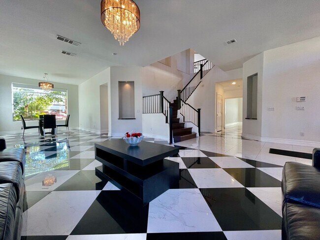 Building Photo - Gated Community - 3 Car Garage - 5 Bedroom...