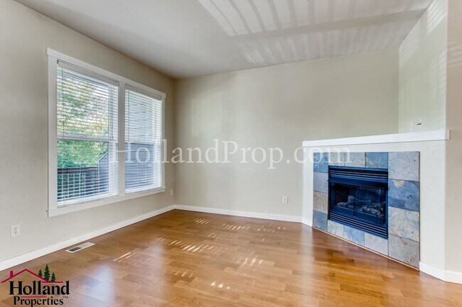 Building Photo - Fantastic Townhouse with 2-Car Garage in E...