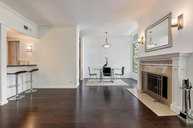 Main living area - dining table / chairs remain in condo if tenant chooses at no additional cost - 14506 Benefit St