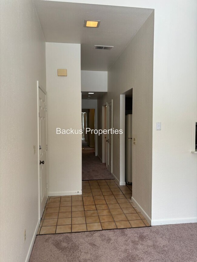 Building Photo - Great upstairs two bedroom condo