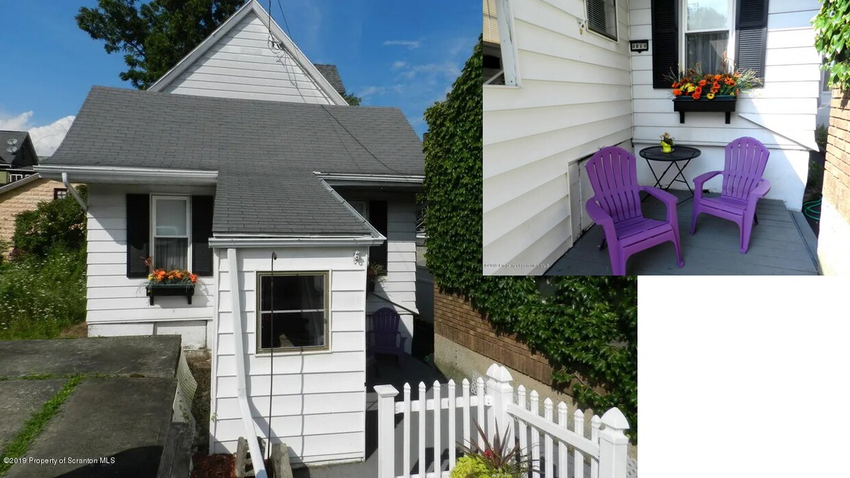 front entrance and side of home, parking on lot in front of home - 1102 Pettibone St