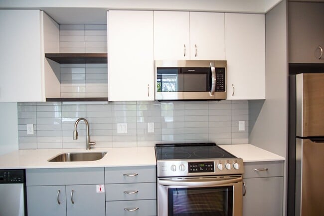Building Photo - Modern 1-Bed w/Condo-Grade Finishes, Washe...
