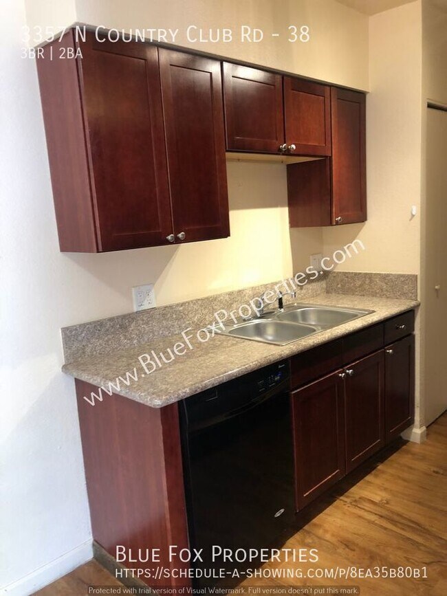 Building Photo - 3357 N Country Club #38