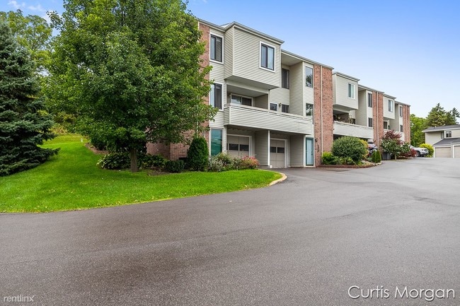Building Photo - 3 br, 2.5 bath Condo - 6215 Acropolis Dr SE