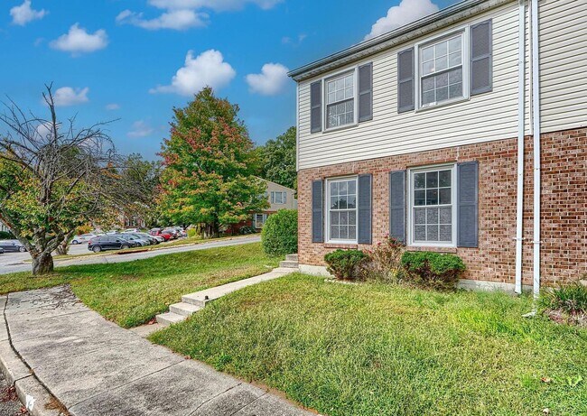 Building Photo - Updated End-of-Group Townhome with Finished Lower Level, Fenced Yard & Community Pool
