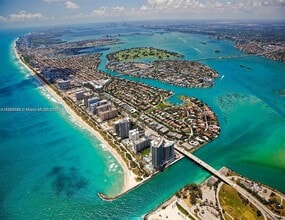 Building Photo - 10275 Collins Ave