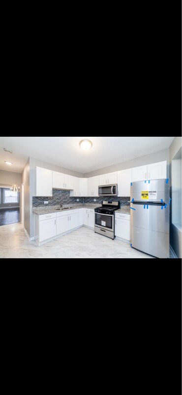 Building Photo - 7108 S Champlain Ave