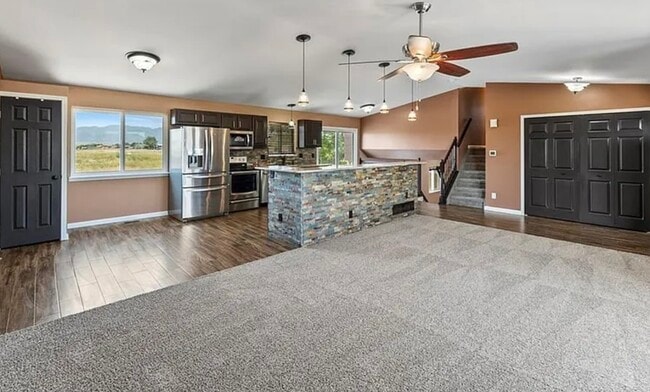 Living room facing kitchen - 7390 Sue Ln