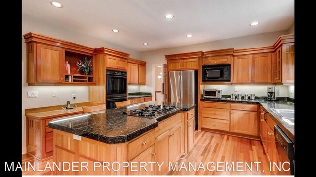 Building Photo - 4 br, 2.5 bath House - 12826 NW LILYWOOD DR