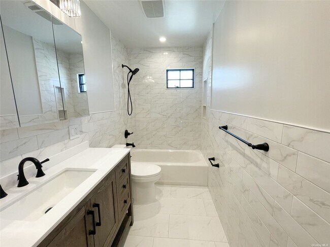 Building Photo - 203-25 27th Ave