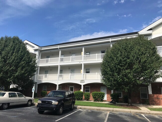 Building Photo - First Floor, End Unit, Two bedroom, Two ba...