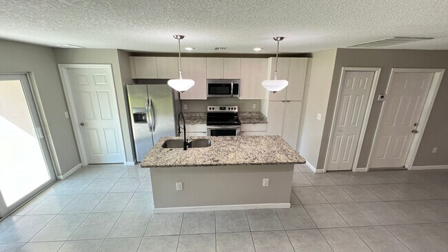 Building Photo - INCREDIBLE 4 Bedroom, 2 Bathroom Home in Palm Bay!!