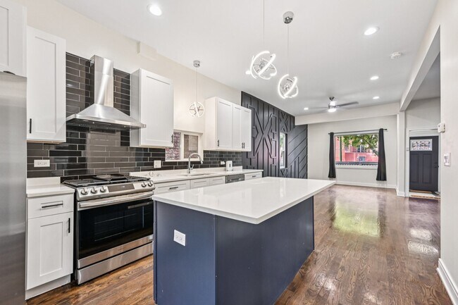 Foto del edificio - 6547 S Langley Ave