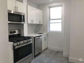 Building Photo - 5995 Riverdale Ave