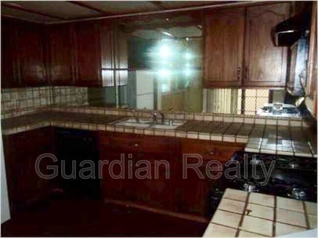 Building Photo - 6693 W Tropicana Ave