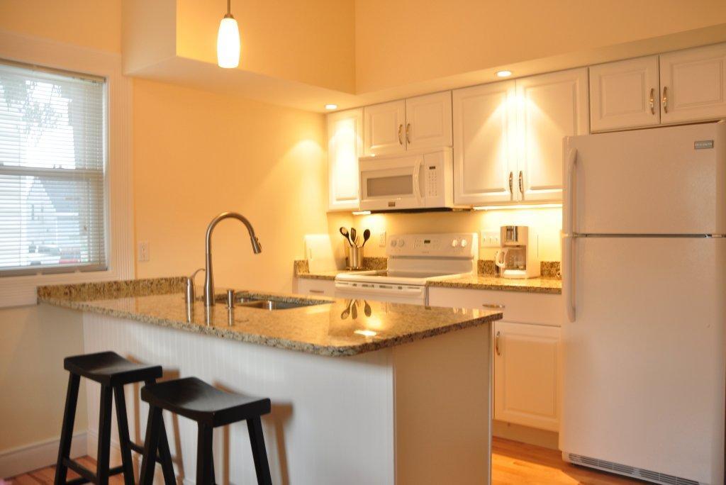 Kitchen with island - 161 Pearl St
