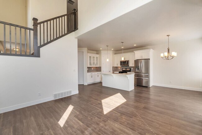 Building Photo - Modern Row End Townhome w 2 car attached g...