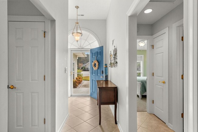 Building Photo - Live the Coastal Lifestyle in This Cypress Keys Beauty!