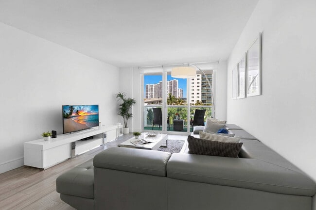 Building Photo - 19370 Collins Ave