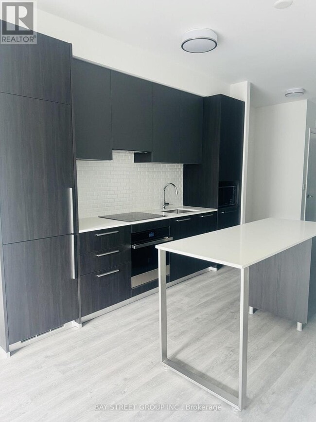 Photo du bâtiment - 65 Broadway Ave