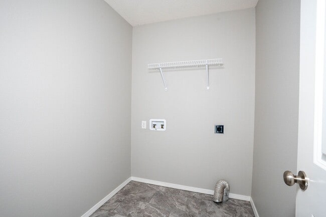 Building Photo - 3 bed home with NEW FLOORING AND FULLY FEN...