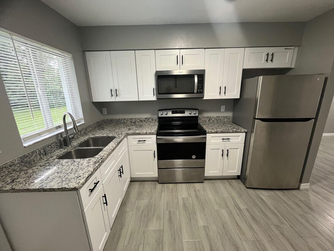 Primary Photo - ** COMPLETELY REMODELD UNFURNISHED 2/1 DUP...