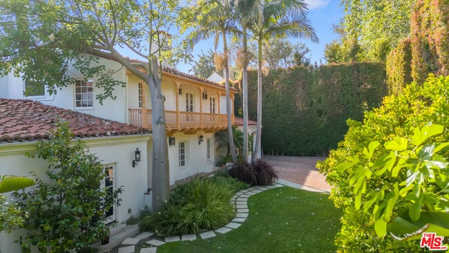 Building Photo - 221 S Beverly Glen Blvd