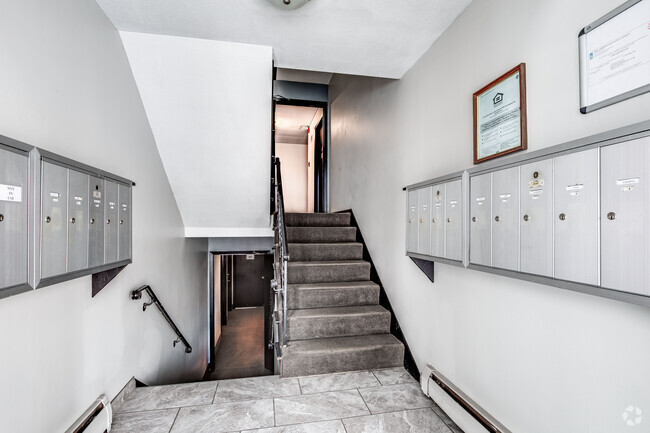 Entrada y el correo - Grand Place Apartments | 2158