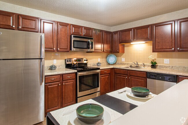 2 habitaciones, 1,5 baños, 1150 pies cuadrados - Greenview Village Apartments