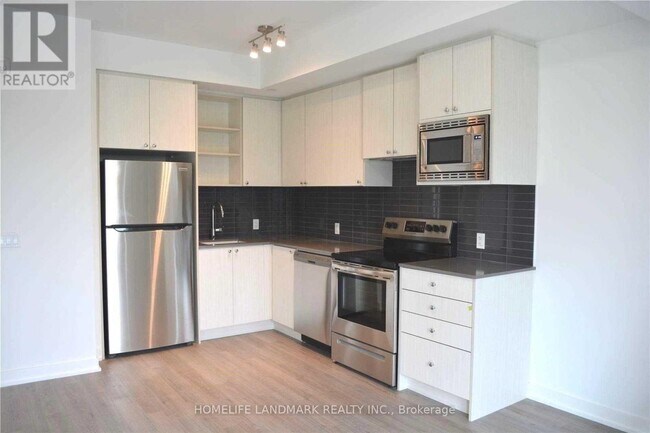 Photo du bâtiment - 155-155 Downsview Park Blvd