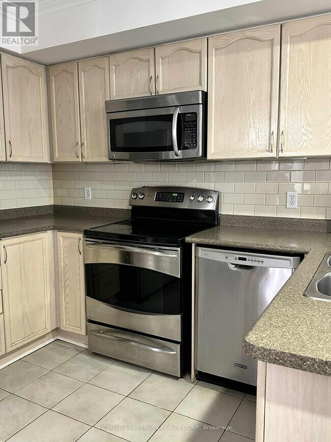 Photo du bâtiment - 605-605 Shoreline Dr