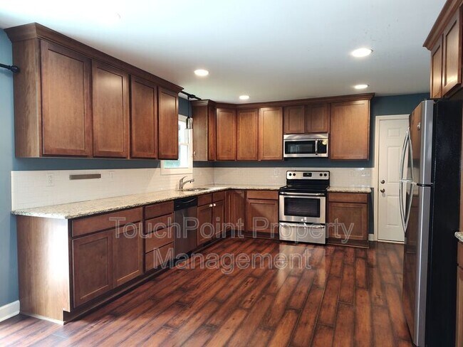 Foto del edificio - 303 Cedarwood Ln