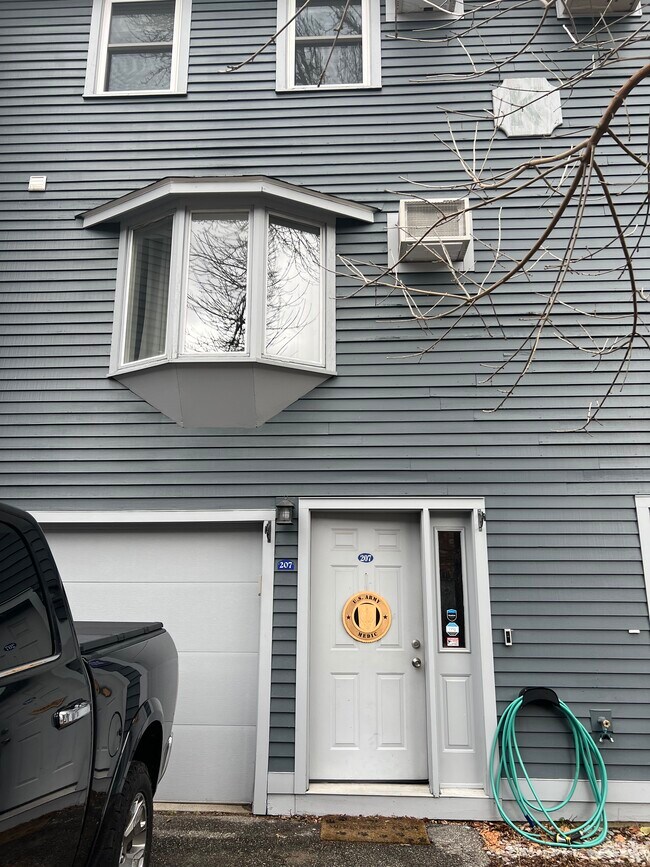 Front of condo/garage. - 207 Valley West Way