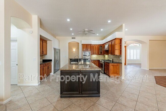 Building Photo - 9537 W Electra Ln