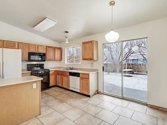 Foto del edificio - "Spacious 4-Bedroom Gem on Quartz Dr – Your Ideal Albuquerque Retreat!"