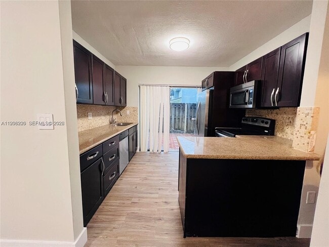 Building Photo - 7060 NW 173rd Dr