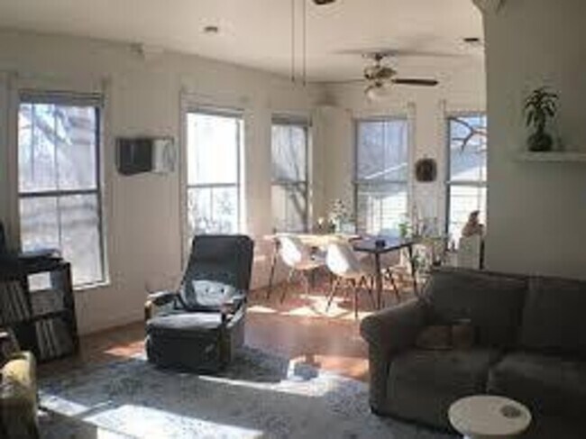living room and dining area - 402 W 44th St