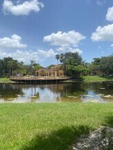 Building Photo - 4887 Via Palm Lakes