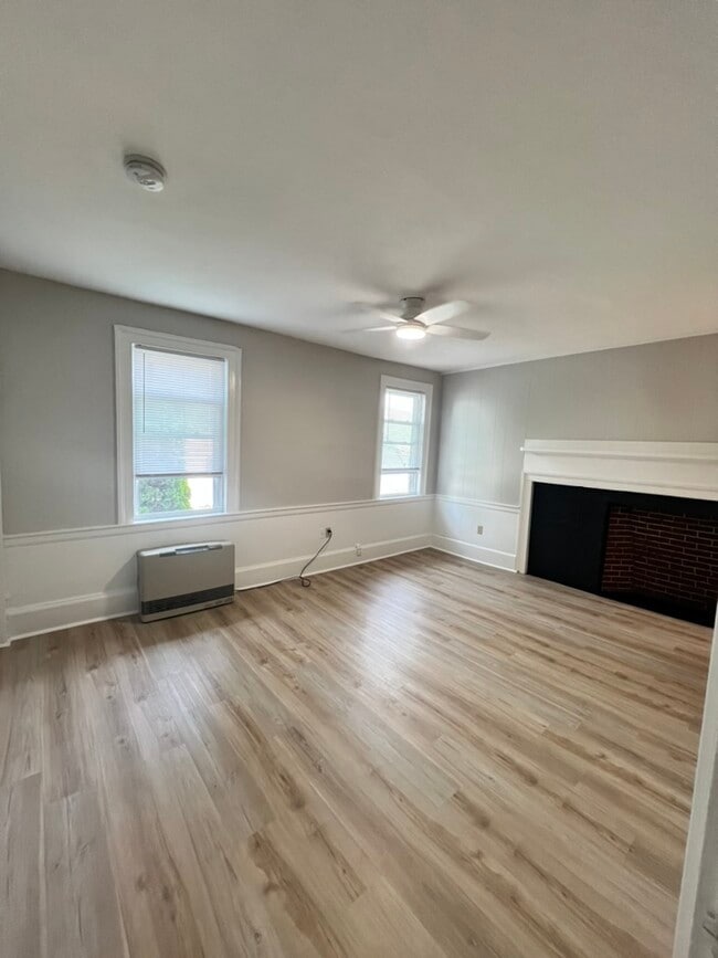 Updated living room with fireplace - 5 Chapel St