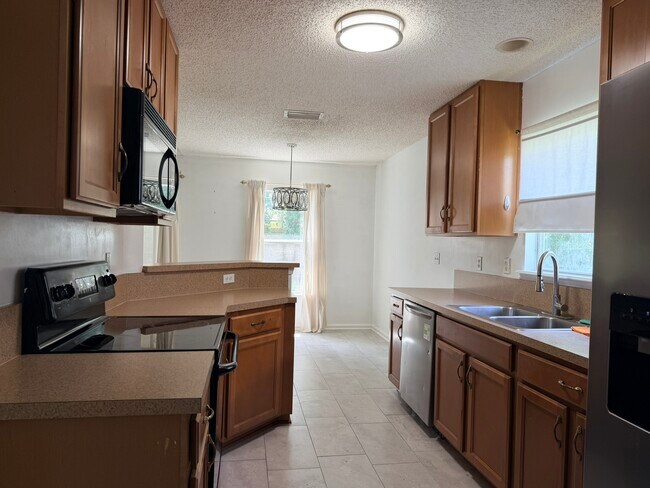 Foto del edificio - 6423 Crimson Leaf Ln